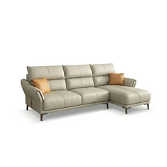 beige leatherette sofa with supportive high back cushions, rounded arms and slim raised legs — room setting showing the re...