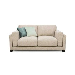 modern neutral fabric sofa with wide padded arms, thick cushions and clean straight lines — front view in a bright living...