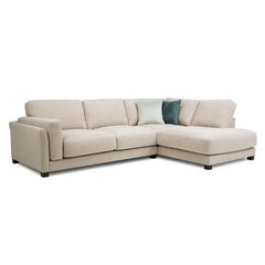 modern neutral fabric sofa with wide padded arms, thick cushions and clean straight lines — side angle showing the arms an...