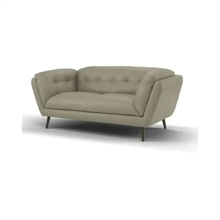 modern fabric sofa with rounded arms, soft cushions and slim raised legs — angled view showing the full shape and cushions