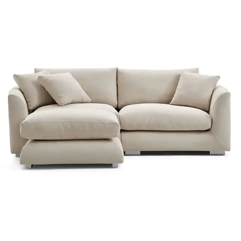 wide l shape fabric sofa with rounded arms, loose back cushions and deep comfortable seating — alternate angle showing the...