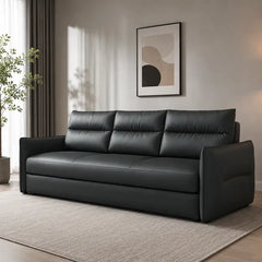 Faux leather sofa bed with hidden storage, with a pull-out sleeping area for overnight guests