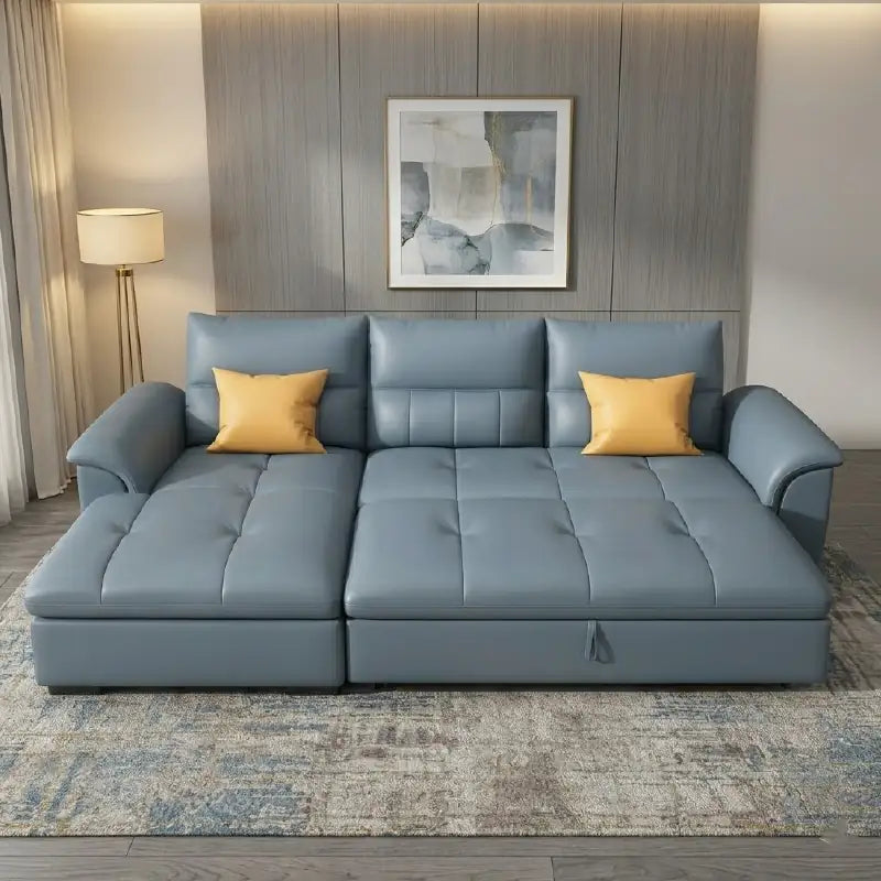 Convertible sofa bed with motorised recliner, with a pull-out sleeping area for overnight guests