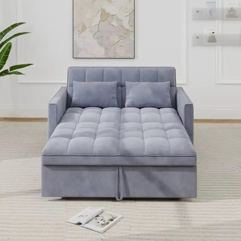 Compact Sofa cum bed, with a pull-out sleeping area for overnight guests