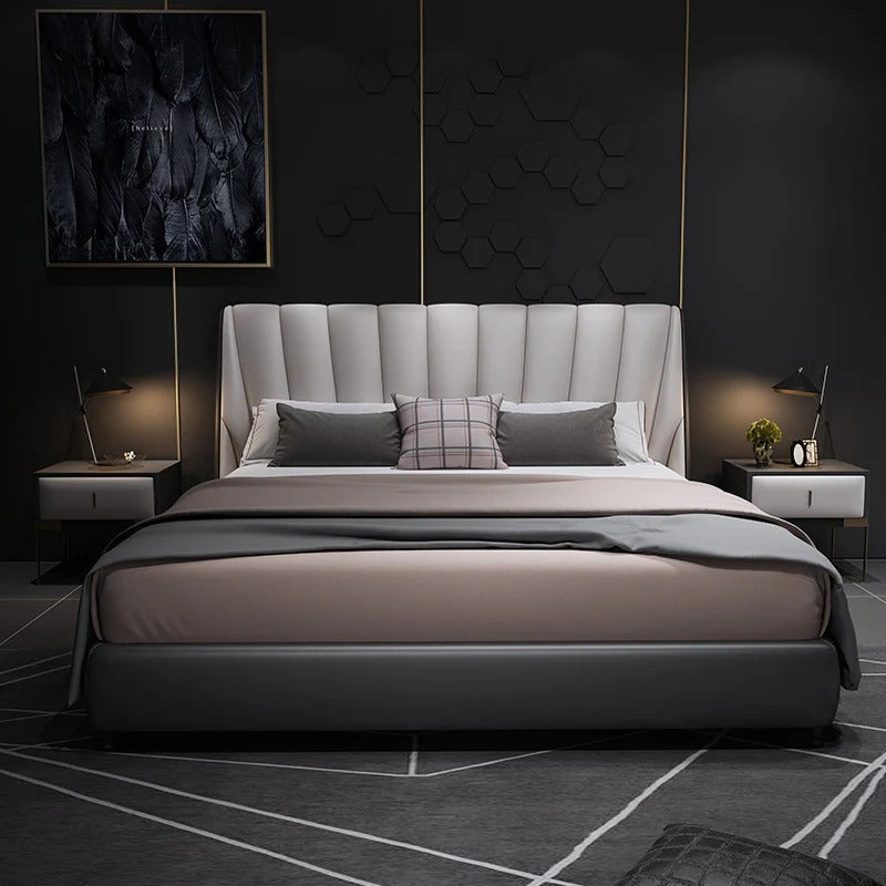 Indigo is a modern upholstered bed with a tall channel-tufted headboard,