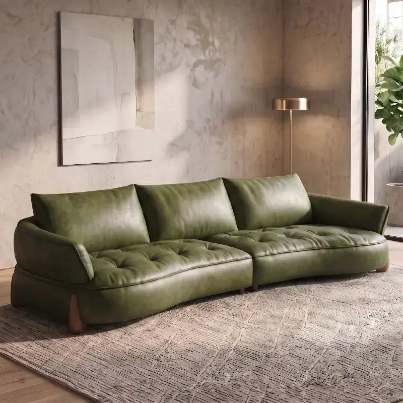 Full front view of Omero leather sofa set with luxury sofa set aesthetics, leather couch comfort, deep tufted cushions, designer couch details, modern sofa styling and 2 seater sofa configuration