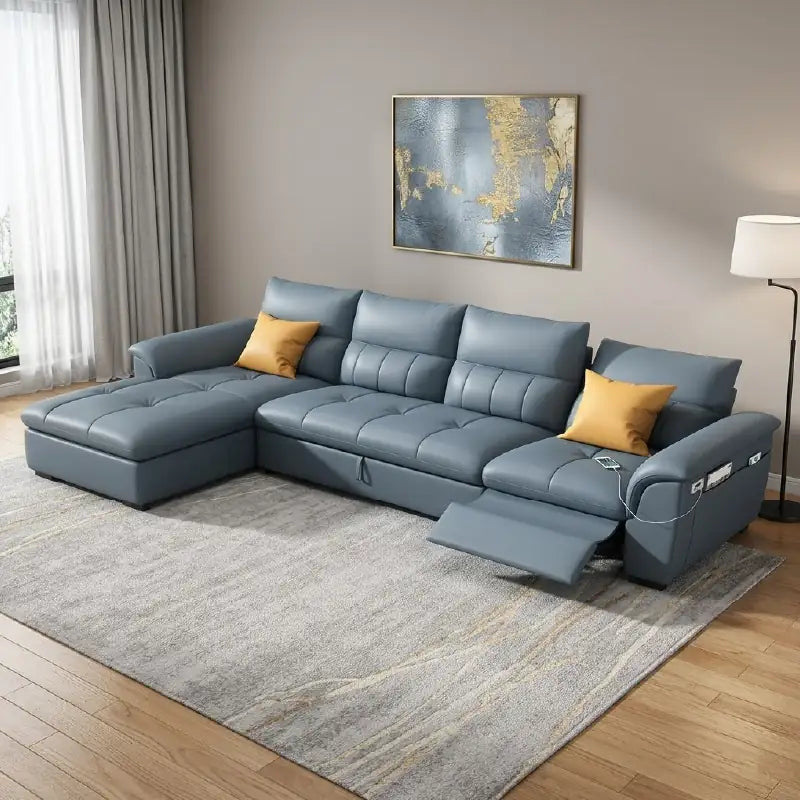 Convertible sofa bed with motorised recliner, with practical features for compact living spaces