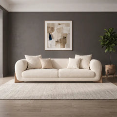 Soft, scatter-style backrest cushions with living room couch and sofa set design – bouclé