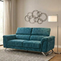 white l shape sofa with wide padded arms, supportive cushions and angled chrome finish legs — close view showing the cushi...
