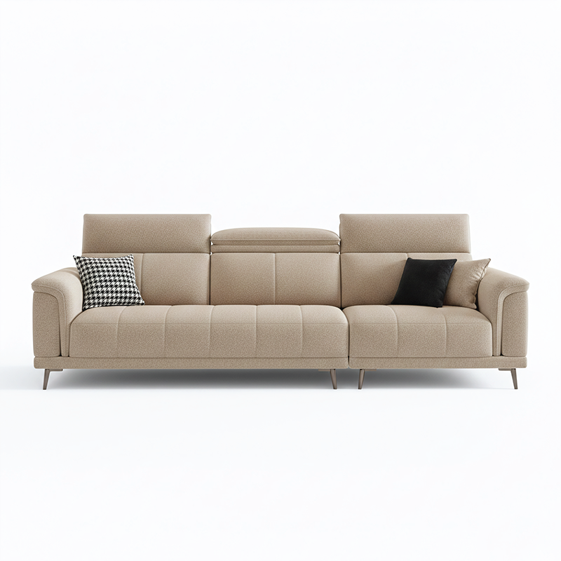 beige l shape sofa with adjustable head support, rounded arms and slim raised legs — close view showing the colour and mat...