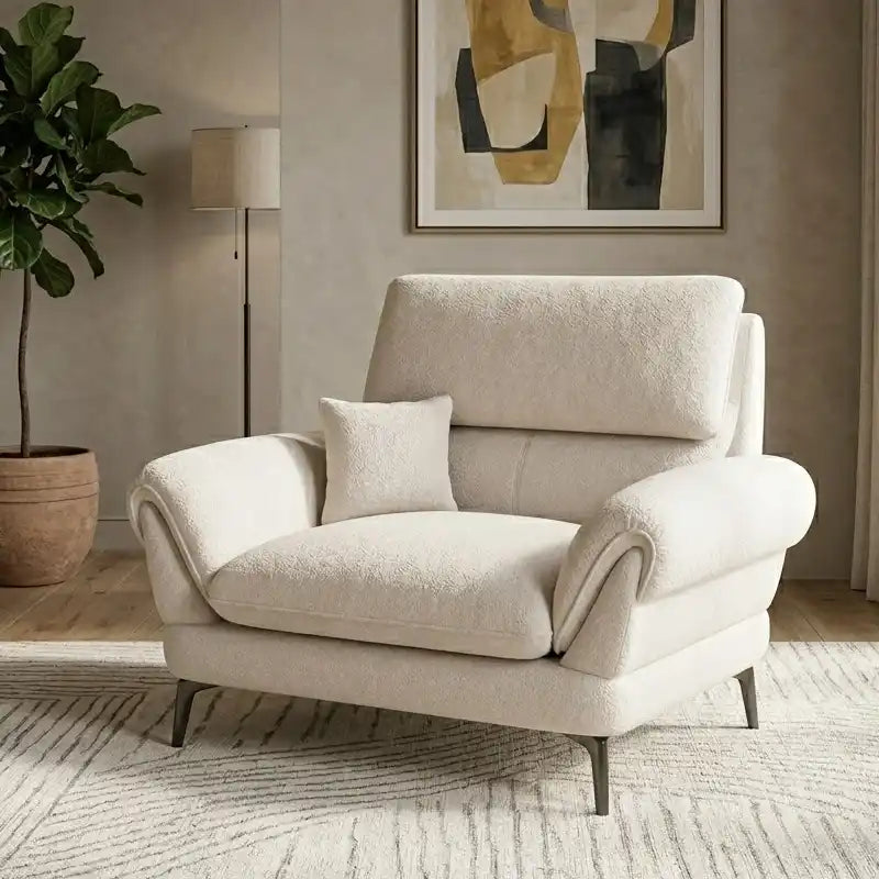 cream textured fabric sofa with curved arms, supportive back cushions and slim dark legs — wide room view showing the comp...