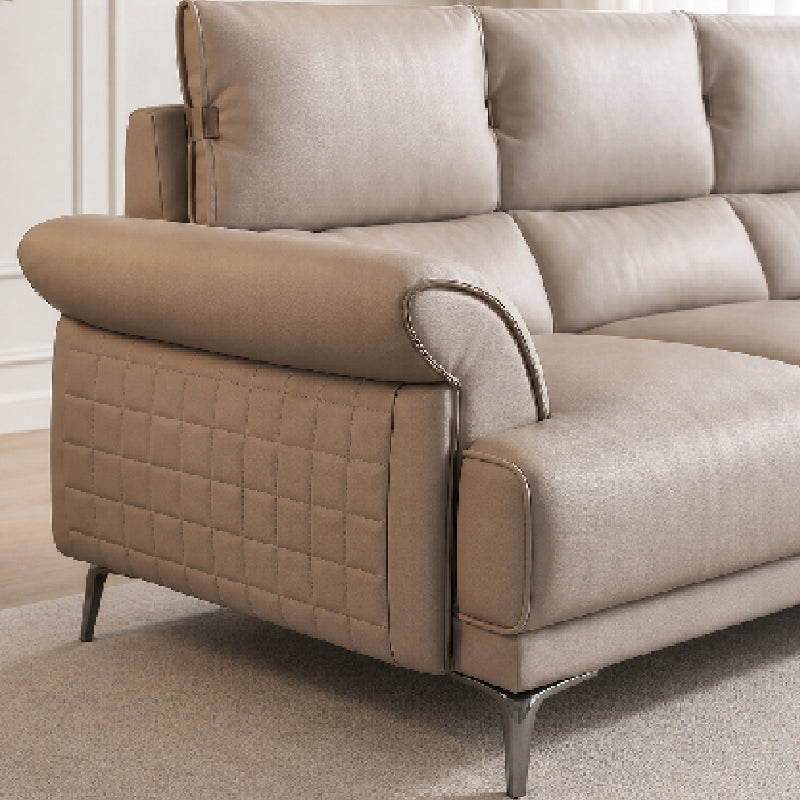 modern l shape sofa with supportive back cushions, neat side details and slim metal legs — wide room view showing the comp...