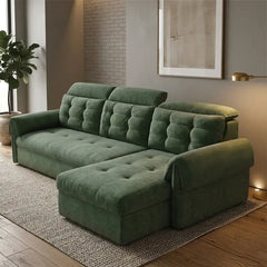Couch with pull-out bed and soft cushions, designed for relaxed seating and guest use