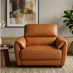tan l shape sofa with deep cushions, supportive back panels and wide padded arms — wide room view showing the complete sea...
