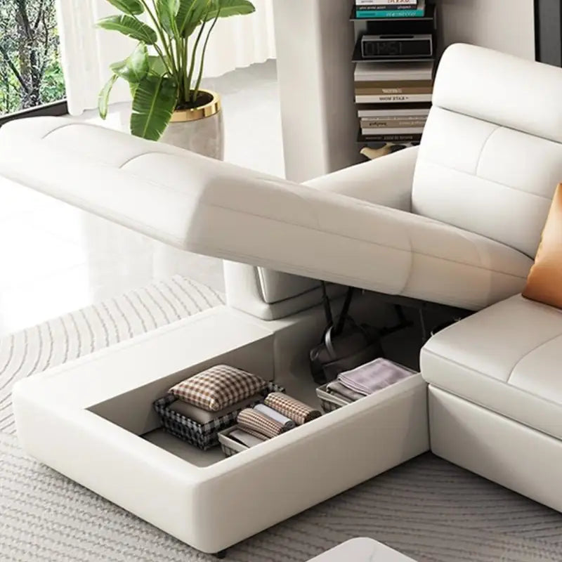 Convertible sofa bed with adjustable headrests, designed for relaxed seating and guest use