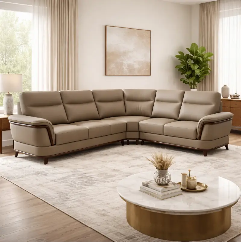 beige pure leather sofa with supportive back cushions, curved arms and refined wooden details — alternate angle showing th...