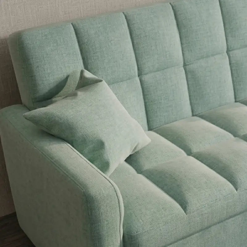 Convertible sofa bed with hidden side storage, designed for relaxed seating and guest use
