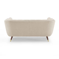 beige fabric sofa with soft curved arms, square cushion details and raised wooden legs — alternate angle showing the full...