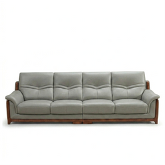corner sofa with deep cushions, rounded arms and warm polished wooden side details — full view with the complete shape cle...