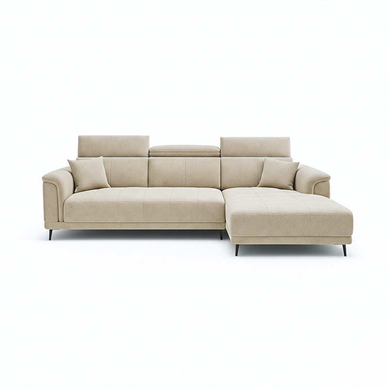 beige l shape sofa with adjustable head support, rounded arms and slim raised legs — front view in a bright living room