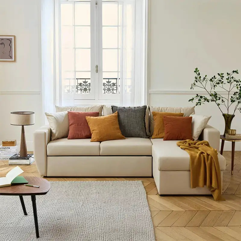 Convertible sofa bed with hidden corner storage, with soft cushioning and a space-saving layout
