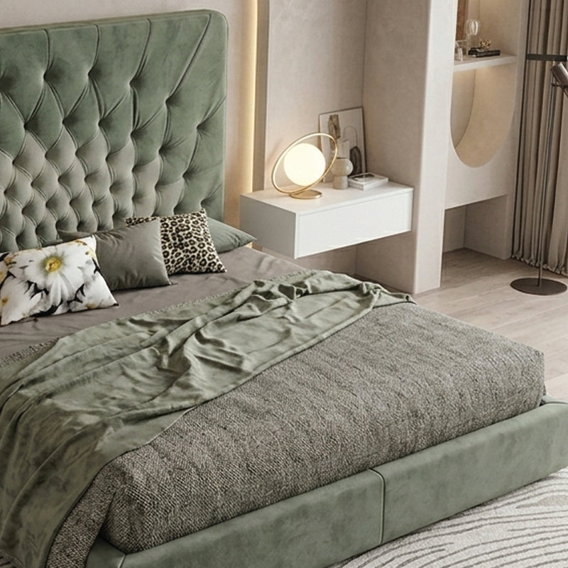 This premium bed frame features a tall floral-inspired tufted headboard with plush dual-tone upholstery in a sophisticated
