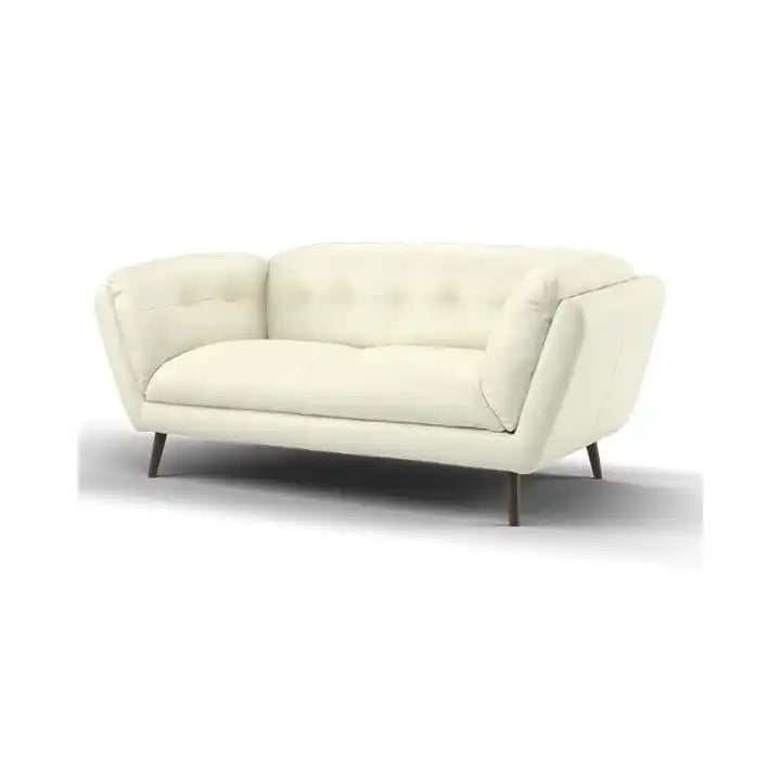 modern fabric sofa with rounded arms, soft cushions and slim raised legs — room setting showing the relaxed seating arrang...