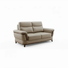 beige pure leather sofa with supportive back cushions, curved arms and refined wooden details — close view showing the cus...