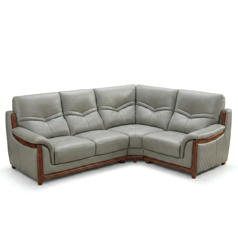 corner sofa with deep cushions, rounded arms and warm polished wooden side details — close view showing the cushion and su...