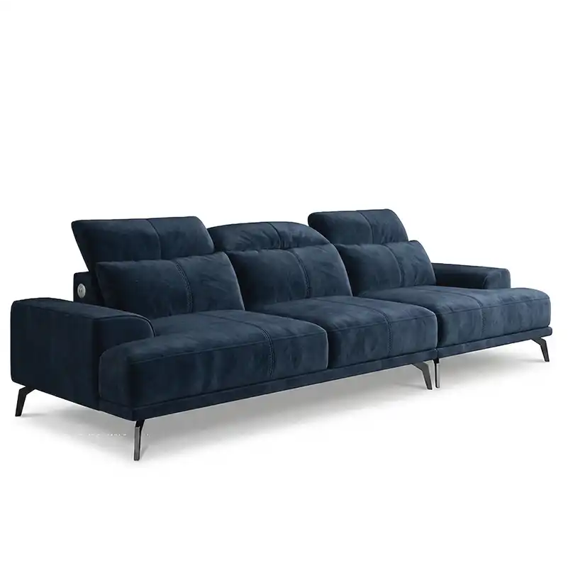 modern l shape sofa with high back cushions, slim metal legs and deep comfortable seating — wide room view showing the com...