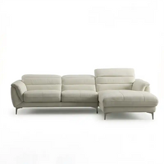 modern l shape sofa with high back cushions, soft rounded arms and slim raised legs — wide room view showing the complete...