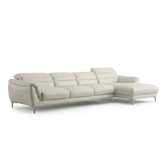 modern l shape sofa with high back cushions, soft rounded arms and slim raised legs — alternate angle showing the full dep...