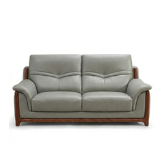 corner sofa with deep cushions, rounded arms and warm polished wooden side details — alternate angle showing the full dept...
