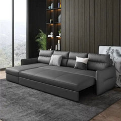 Faux leather sofa bed with hidden storage, shown as a flexible seating and sleeping option