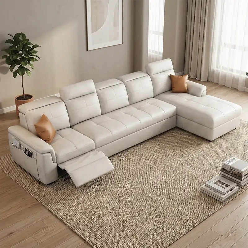Convertible sofa bed with adjustable headrests, shown as a flexible seating and sleeping option
