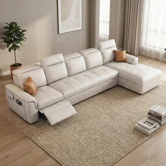 Convertible sofa bed with adjustable headrests, shown as a flexible seating and sleeping option