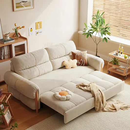 Compact pull out sofa bed, shown as a flexible seating and sleeping option