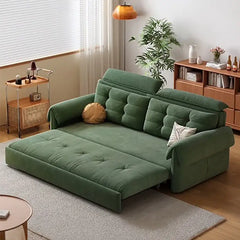 Couch with pull-out bed and soft cushions, shown as a flexible seating and sleeping option