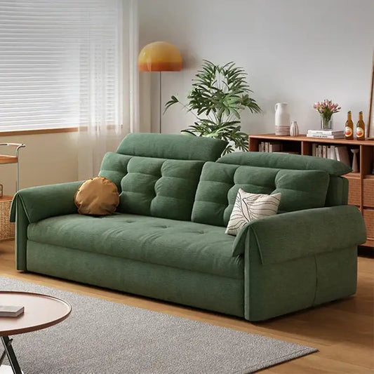 Couch with pull-out bed and soft cushions, with a pull-out sleeping area for overnight guests