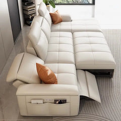 Convertible sofa bed with adjustable headrests, with a pull-out sleeping area for overnight guests