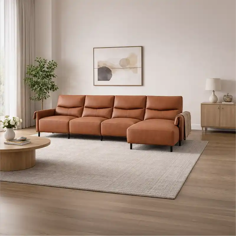 rich tan l shape sofa with smooth easy clean finish, supportive cushions and flexible layout — side angle showing the arms...