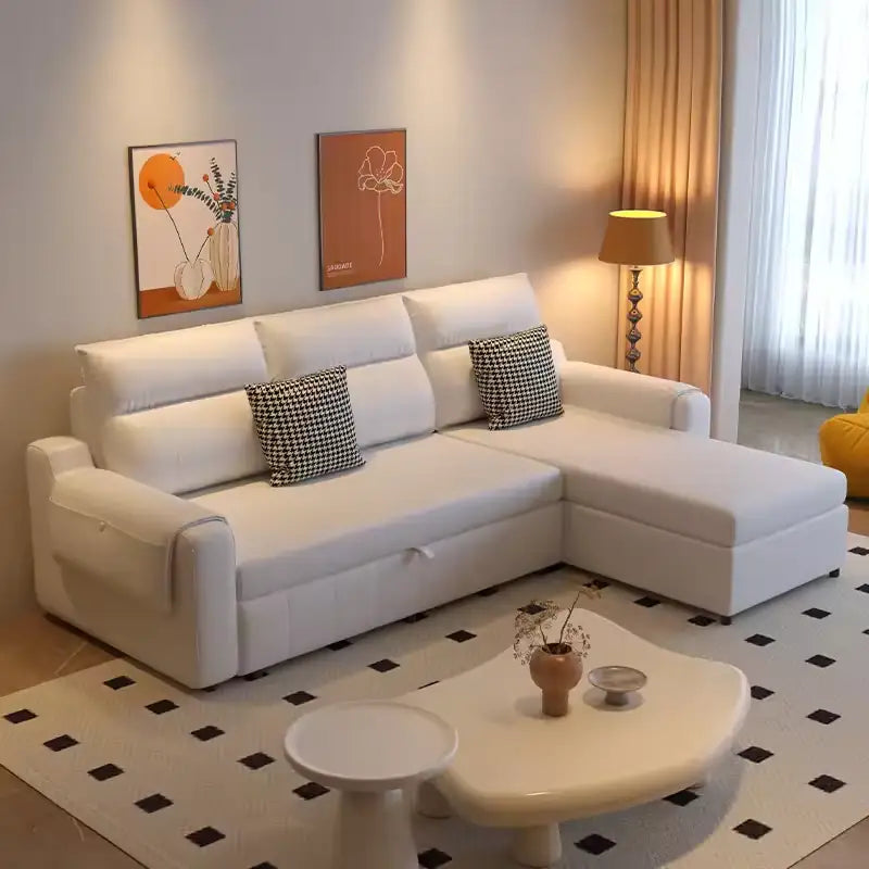 Sofa cum bed bed with wide cushioned arms, with a pull-out sleeping area for overnight guests