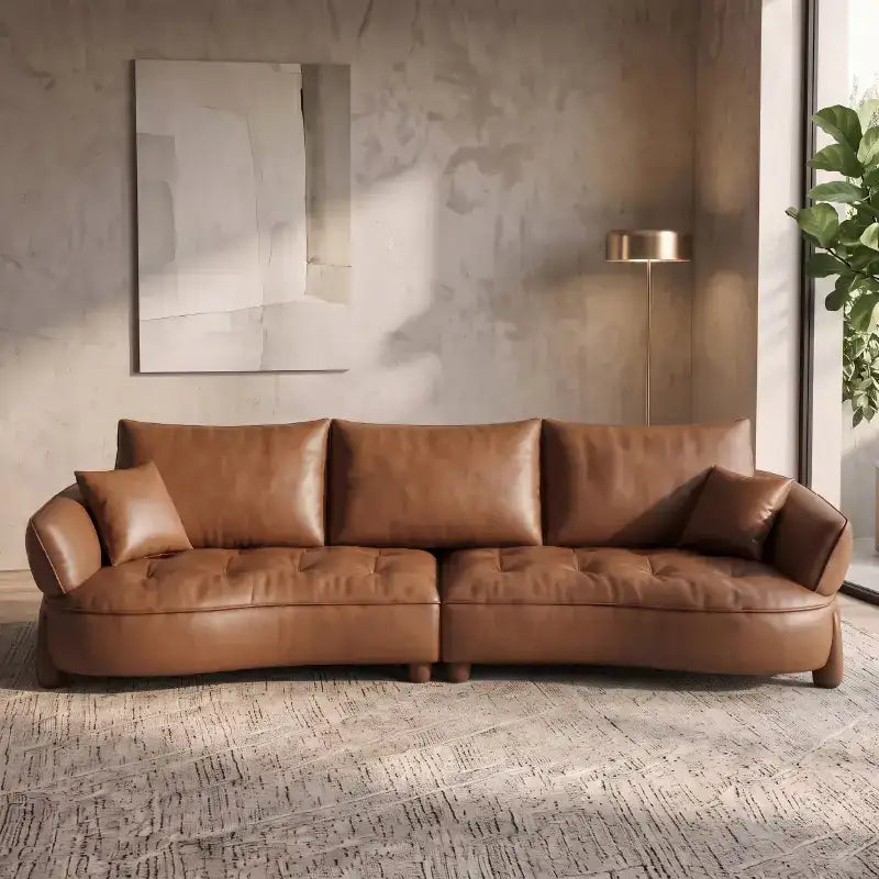 Full front view of Omero leather sofa set with luxury sofa set aesthetics, leather couch comfort, deep tufted cushions, designer couch details, modern sofa styling and 2 seater sofa configuration