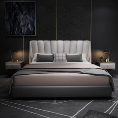 Indigo is a modern upholstered bed with a tall channel-tufted headboard,
