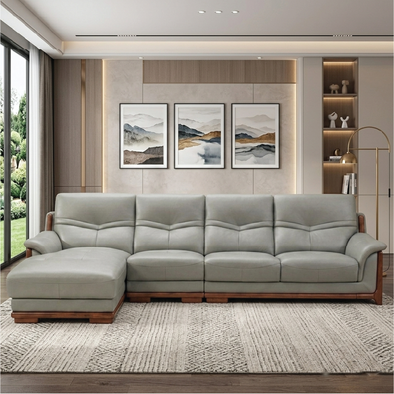corner sofa with deep cushions, rounded arms and warm polished wooden side details — angled view showing the full shape an...
