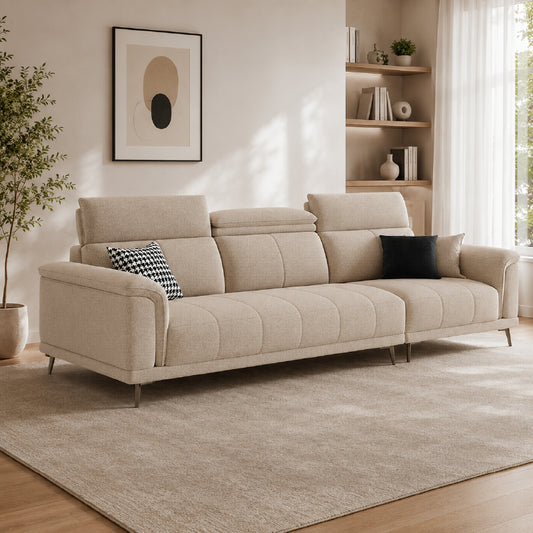beige l shape sofa with adjustable head support, rounded arms and slim raised legs — front view in a bright living room