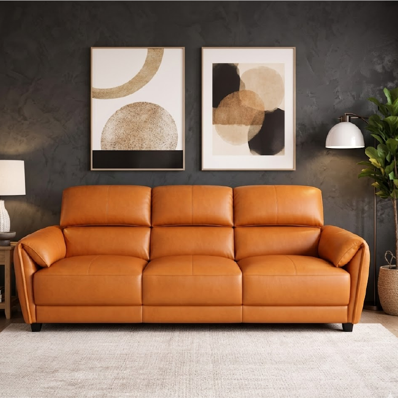 tan l shape sofa with deep cushions, supportive back panels and wide padded arms — side angle showing the arms and raised...