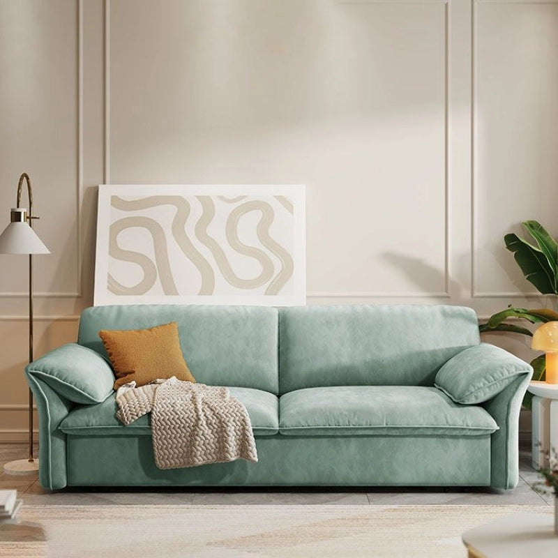 Pull-out sleeper sofa with a flat sleeping surface, with practical features for compact living spaces
