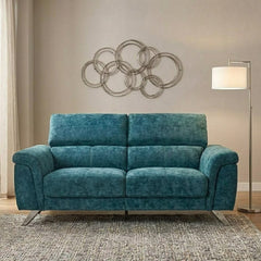 white l shape sofa with wide padded arms, supportive cushions and angled chrome finish legs — side angle showing the arms...