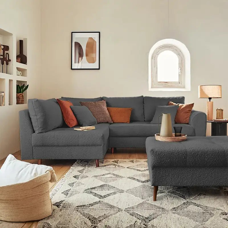 Sleeper sofa with a movable footstool, available in custom sizes, colours and materials